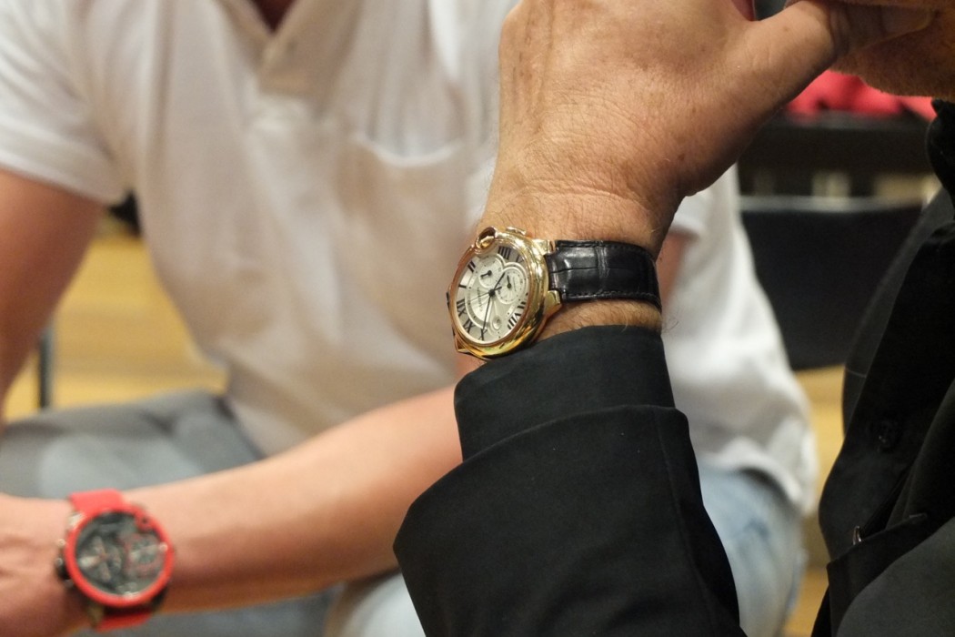 die Uhr des Unternehmers, eine Cartier.